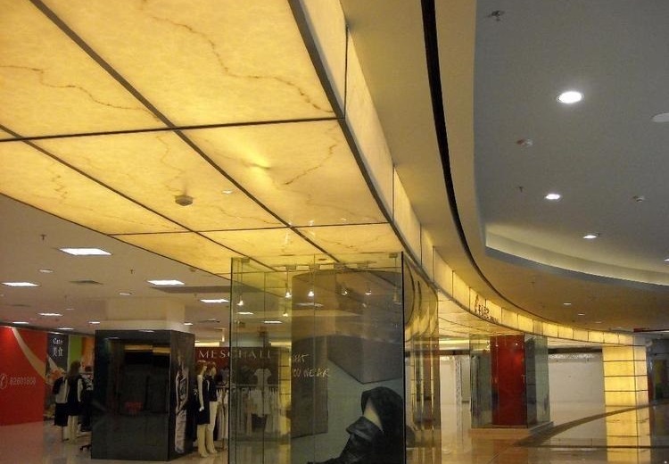 Flexible LED light sheets illuminating a curved translucent stone ceiling
